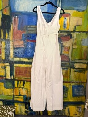 Chino by Anthropologie ivory wide legged cross front tie sash jumpsuit size 2